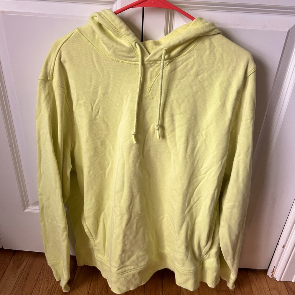 yellow sweatshirt